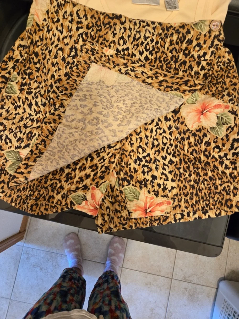 2 Piece skort and tank top, top is PM and bottom is PS. Skort is roomy.